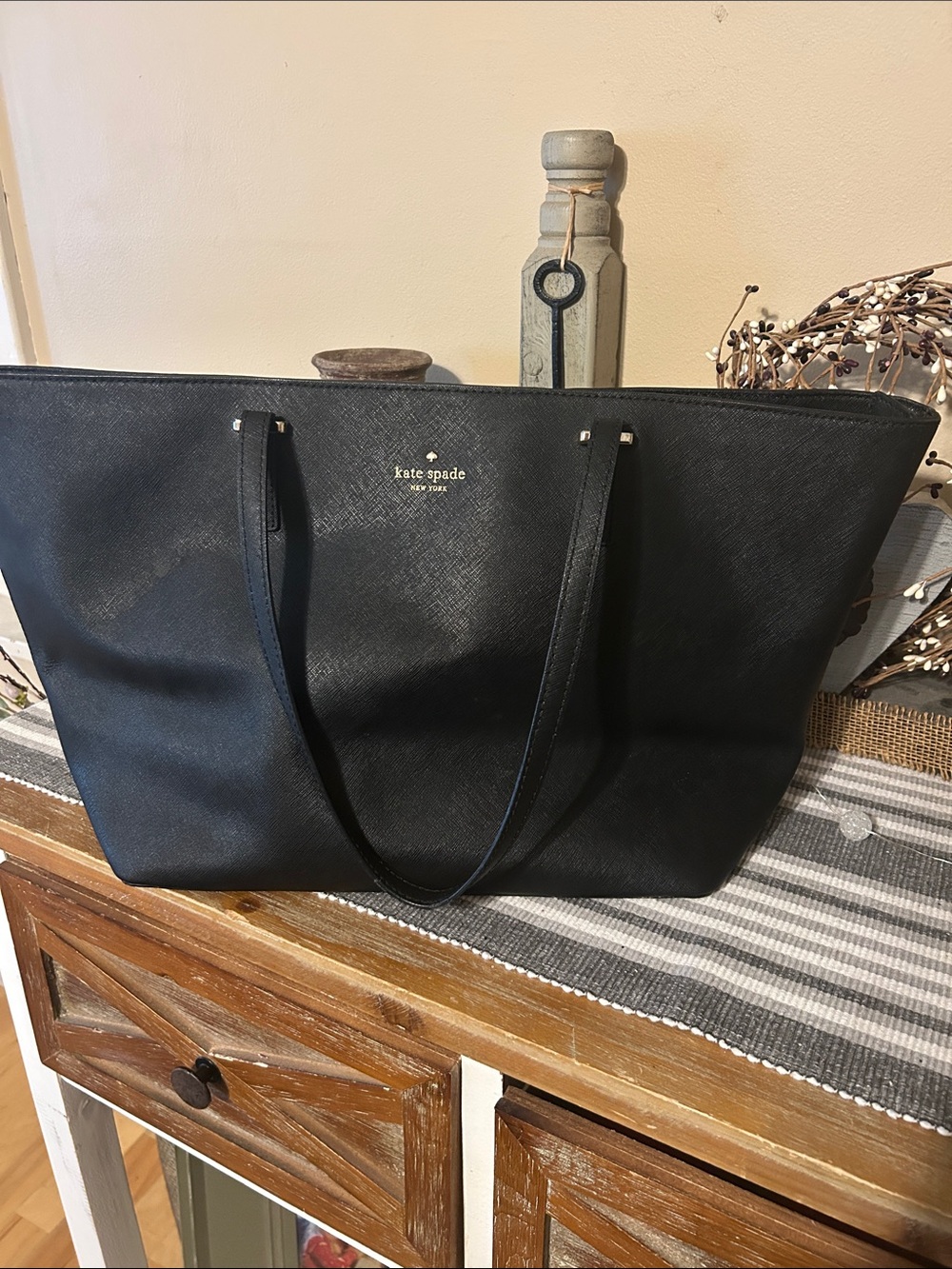 kate spade black leather tote with gold logo detail
